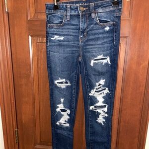 Navy American eagle distressed jeans.